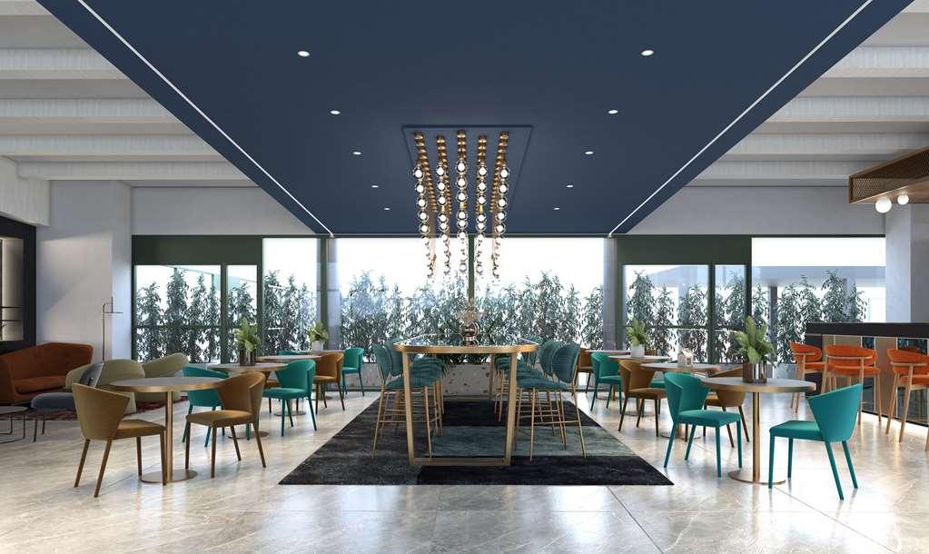 Отель Doubletree By Hilton Milan Malpensa Сольбьяте-Олона Ресторан фото