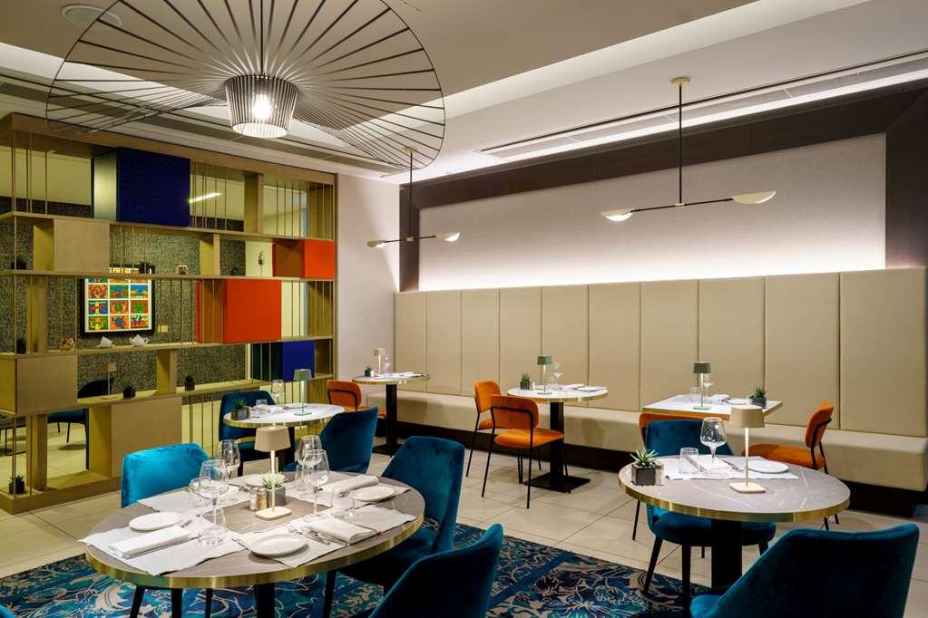 Отель Doubletree By Hilton Milan Malpensa Сольбьяте-Олона Ресторан фото