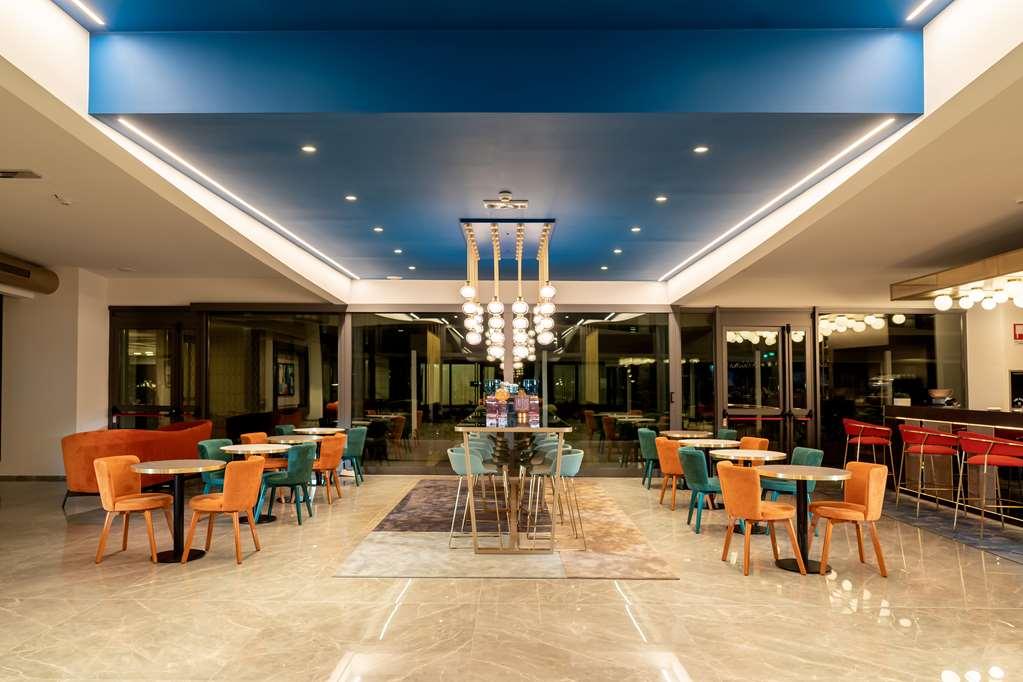 Отель Doubletree By Hilton Milan Malpensa Сольбьяте-Олона Ресторан фото